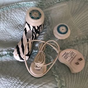 Clarisonic with charger and new brush head